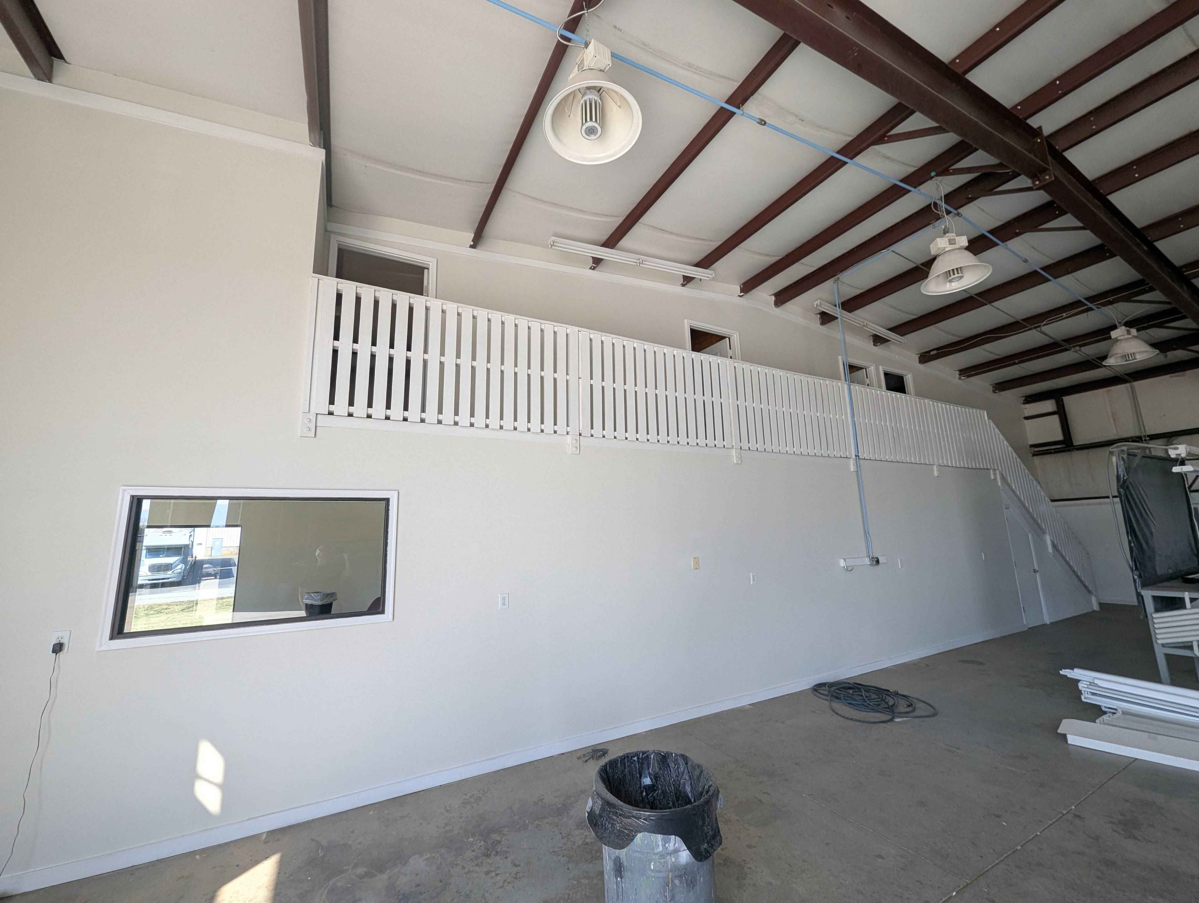 Interior warehouse painting for a commercial space.